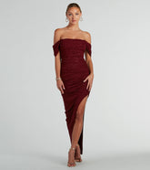 Turn heads at Prom 2025 in this wine prom dress, where statement-making details meet the iconic style of the Kairi Off-The-Shoulder Glitter Mesh Formal Dress .