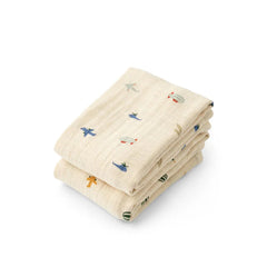 Cremefarverde stofbleer med print af køretøjer, som flyvemaskiner, helikopter, luftballoner og meget mere.